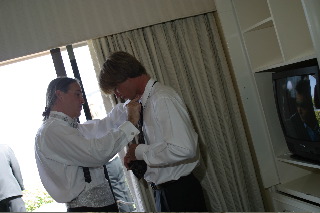 Lee & Nick tieing a necktie