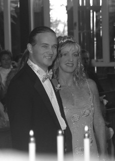 Bride & groom with unity candles (b&w)